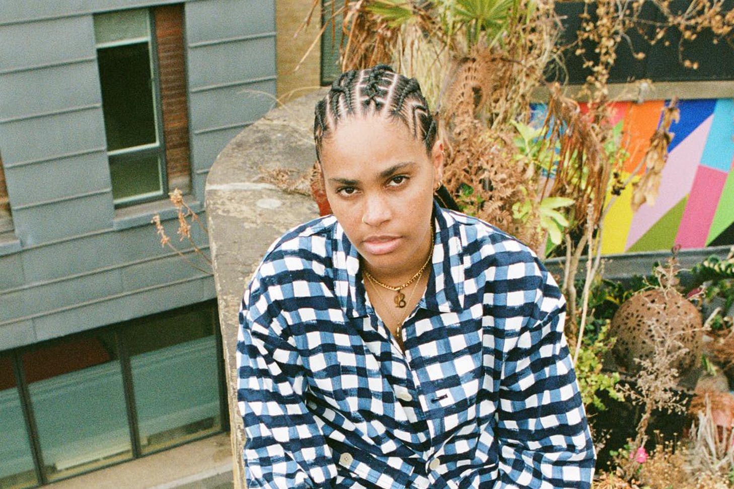 An image of JessB sitting and looking directly at the camera